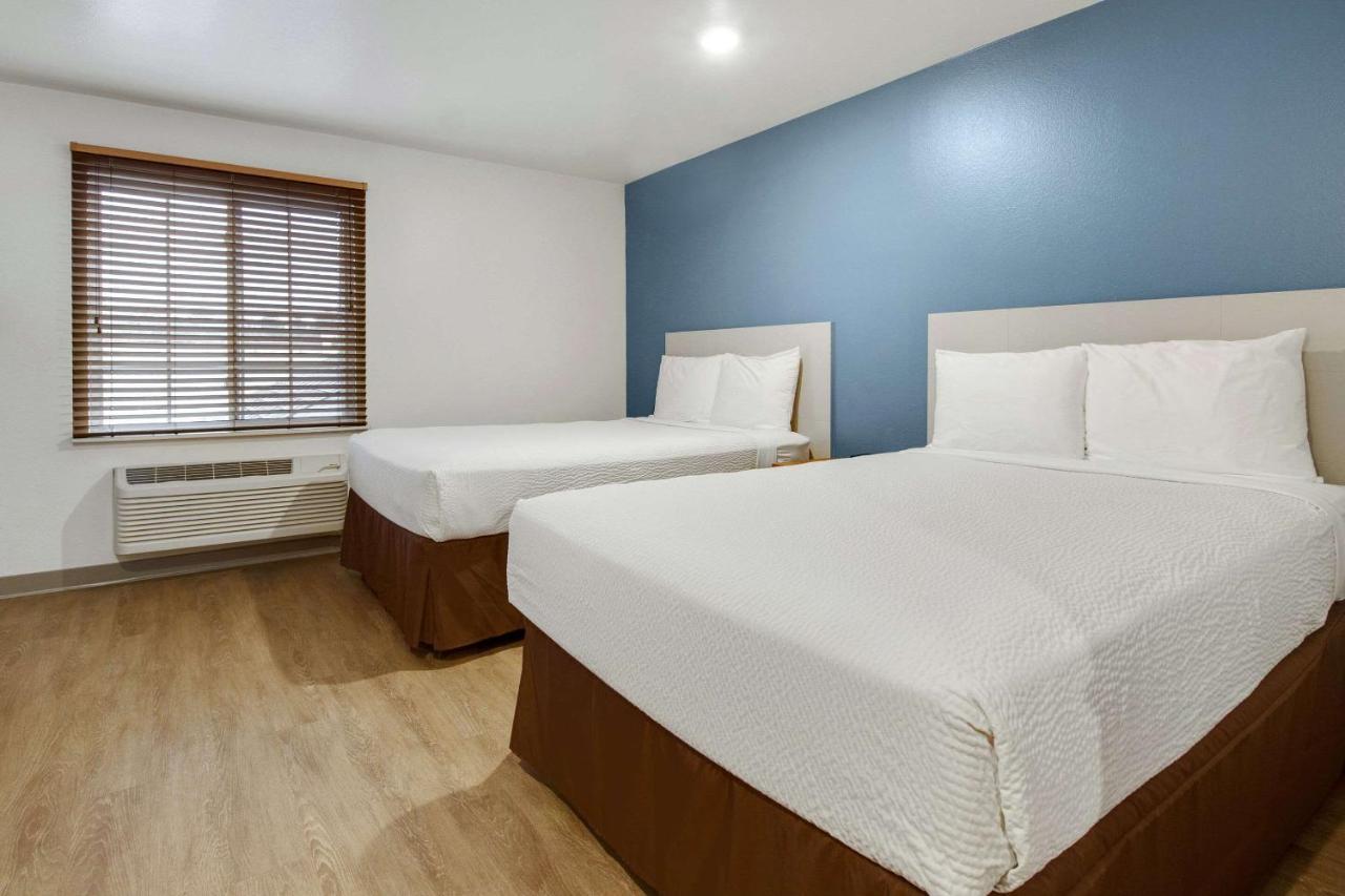 Woodspring Suites Conroe Exterior foto