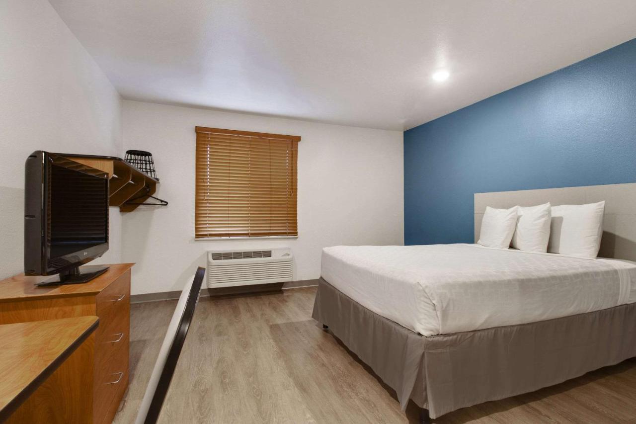 Woodspring Suites Conroe Exterior foto